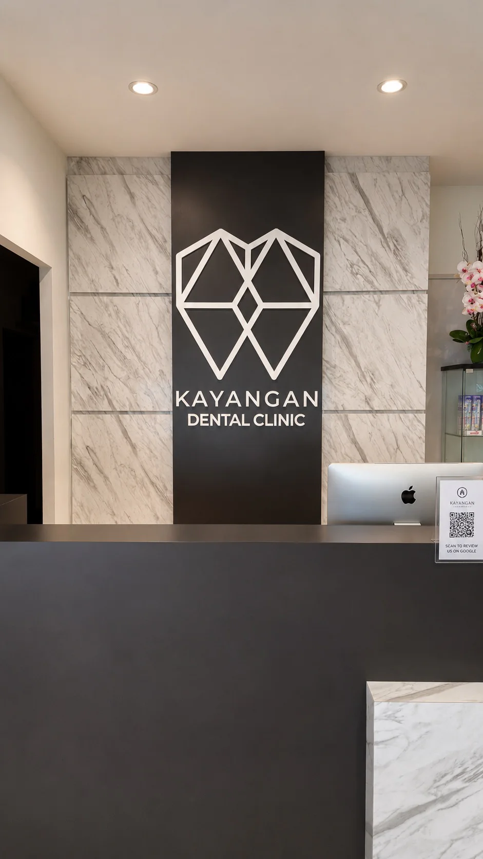 Kayangan Dental Clinic reception counter and feature wall