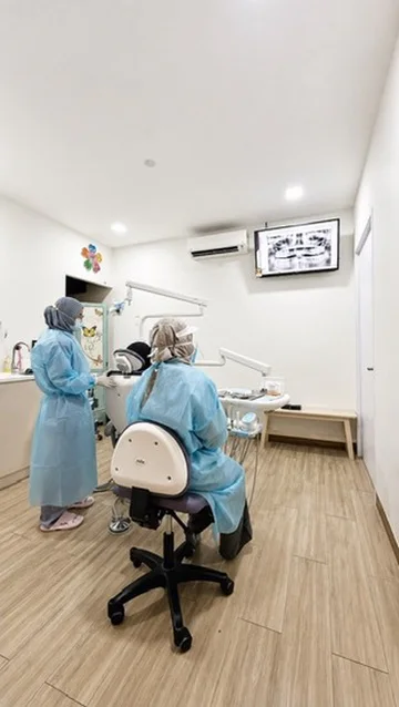 Clinical team working in a Kayangan Dental Clinic treatment room